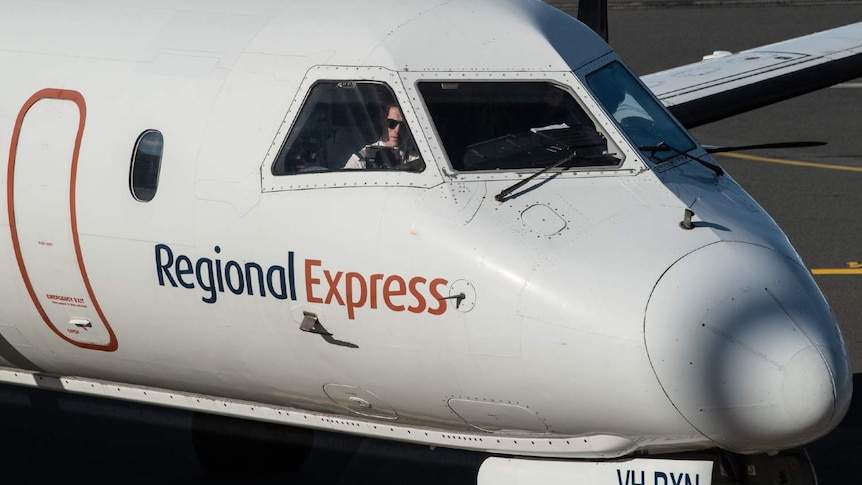 A close up of a regional express airplane.