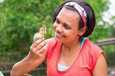 Miranda holding a duckling