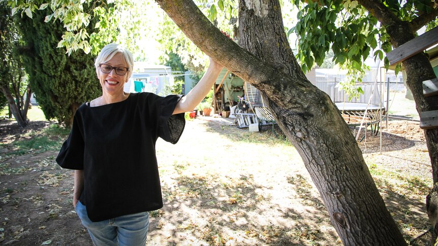 Director Janice Muller in her Newstead backyard, the venue for the play The Tribe.