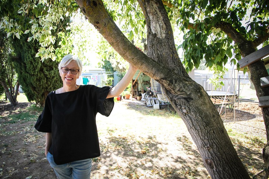 Director Janice Muller in her Newstead backyard, the venue for the play The Tribe.