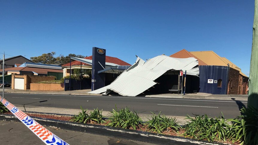 A roof came off a building next to Wollongong Hospital.