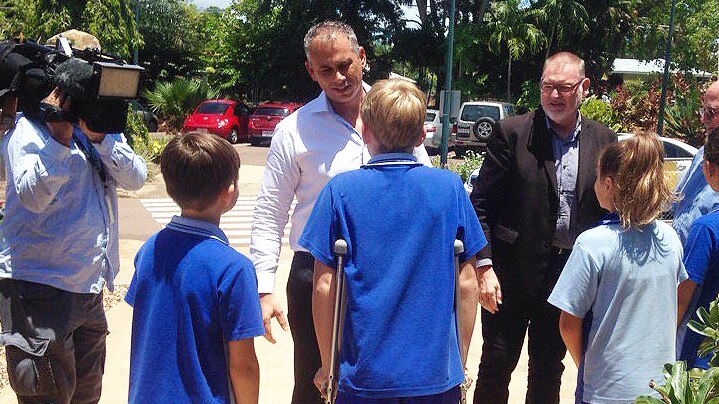 NT Chief Minister Adam Giles [centre] and Education Minister Peter Chandler [right] at a school funding announcement.