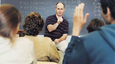 Teacher lecturing students