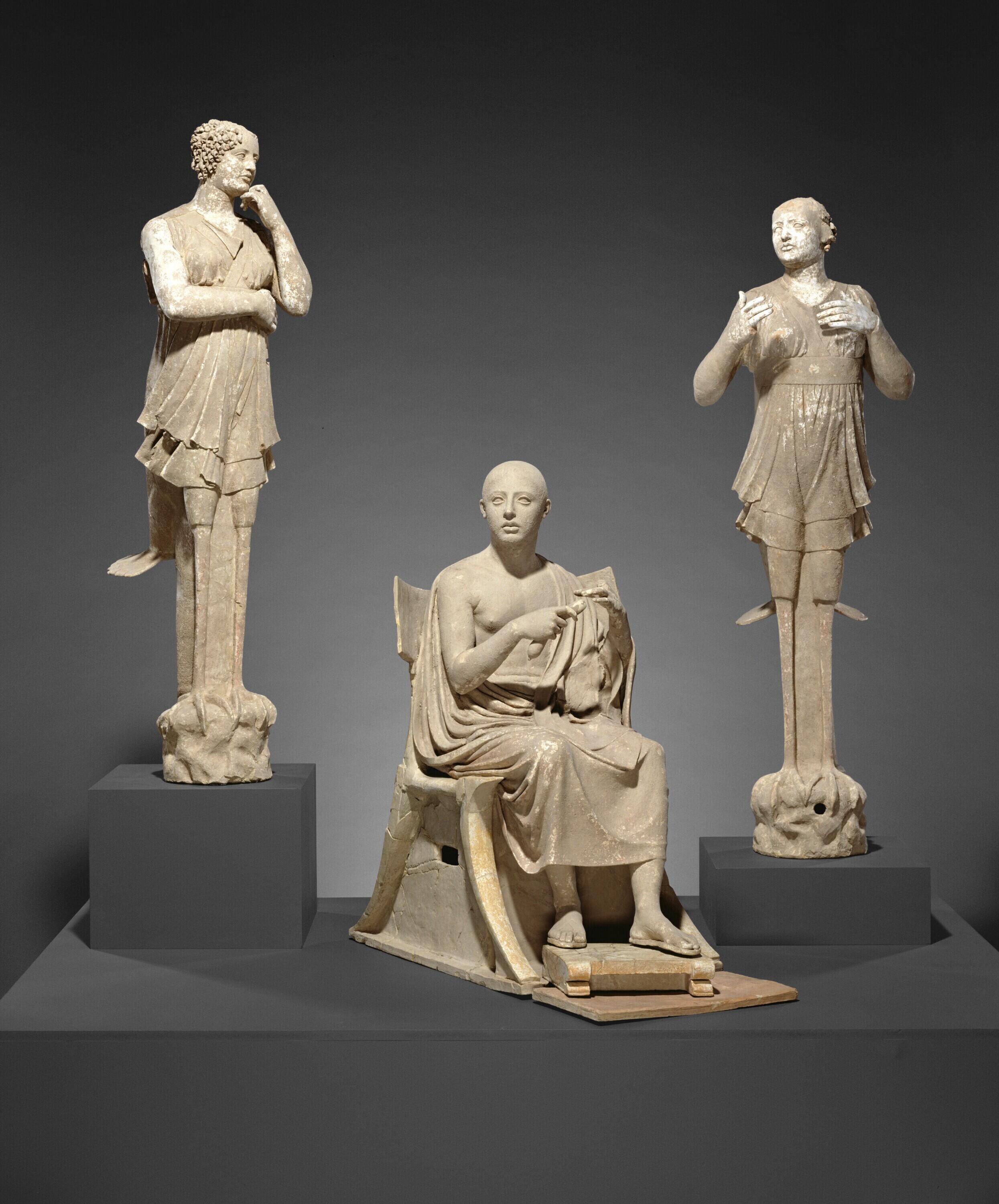 This photo shows a group of three nearly life-size statues known as Orpheus and the Sirens