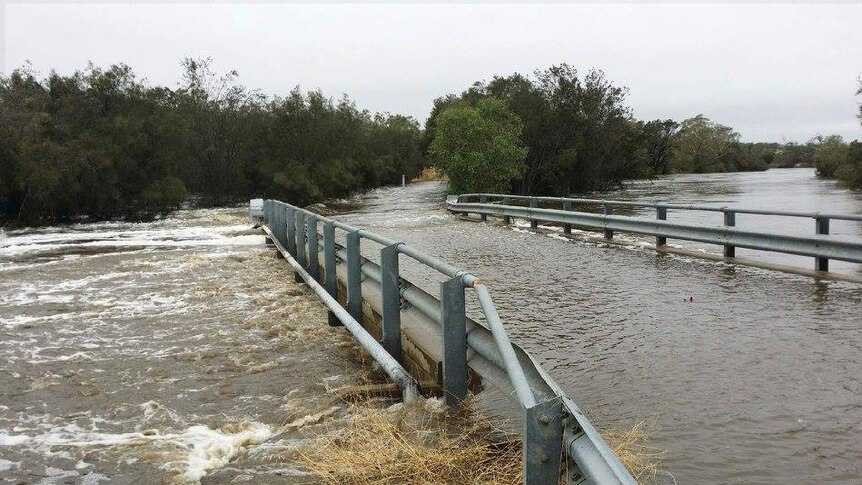 Flooding over Katrine bridge on the Avon River in the WA shire of Northam.