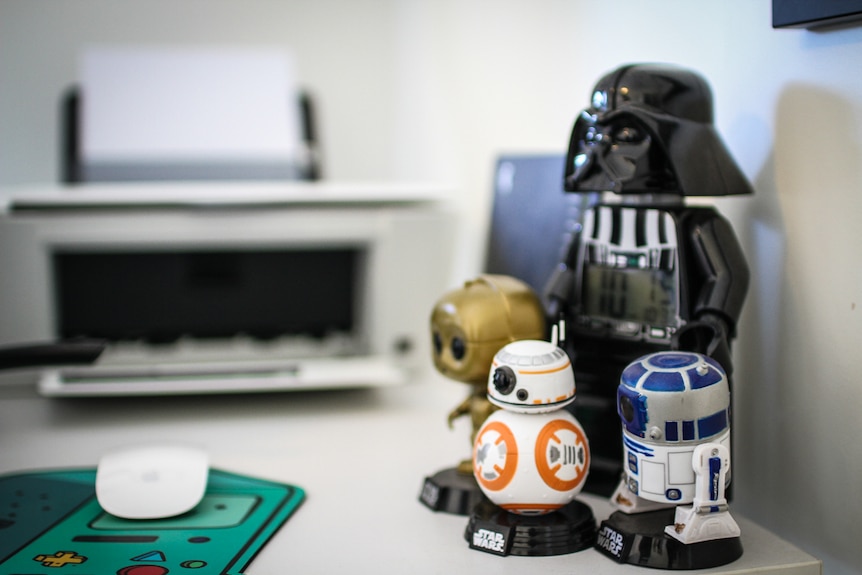 Being a big fan of the space saga Chris Kennett's desk is adorned with Star Wars toys.