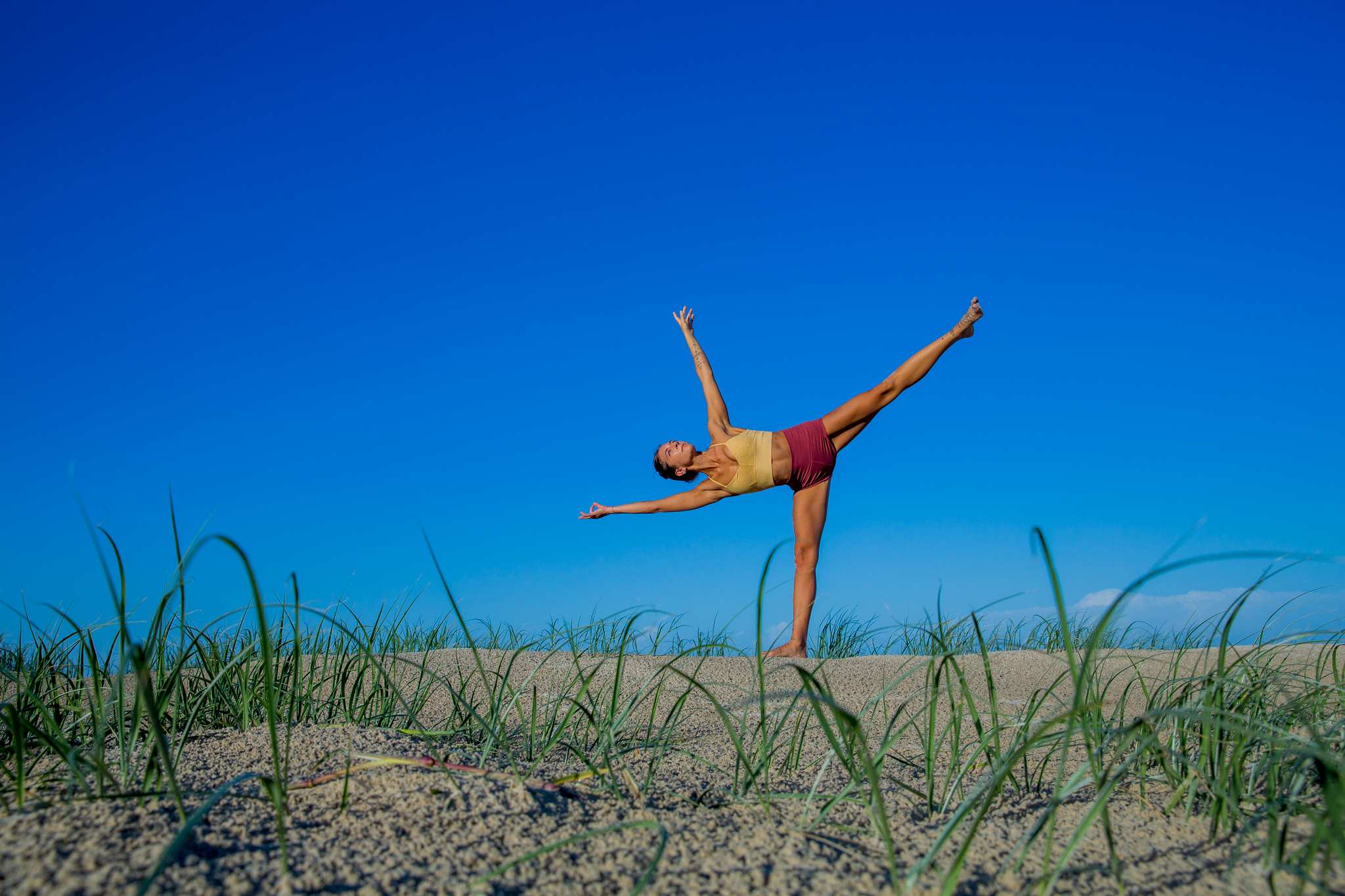 Lara practising Half Moon pose, featured in this balance sequence.