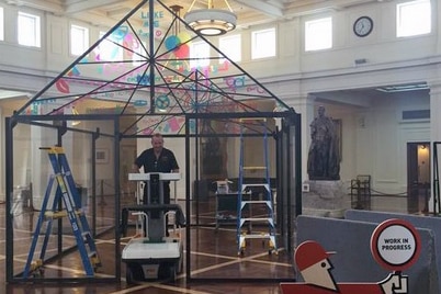 A Great Kaleidoscope Cubby has been built in Kings Hall for people to write political messages on.