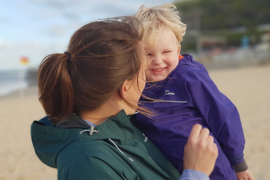 Ellie and Leo Knock on a beach