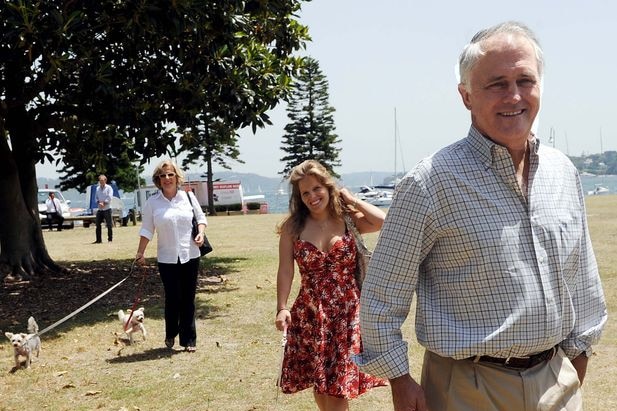 Malcolm Turnbull, his daughter Daisy and wife Lucy take their dogs for a walk
