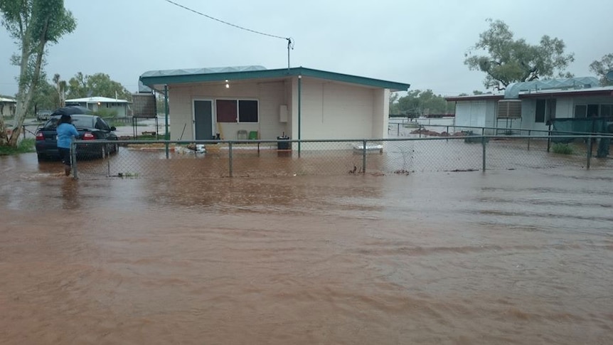 Flooded house in street at Dajarra, south of Mount Isa in north-west Queensland on February 28, 2014