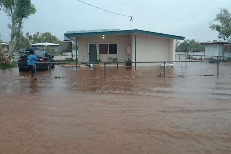 Flooded house in street at Dajarra, south of Mount Isa in north-west Queensland on February 28, 2014