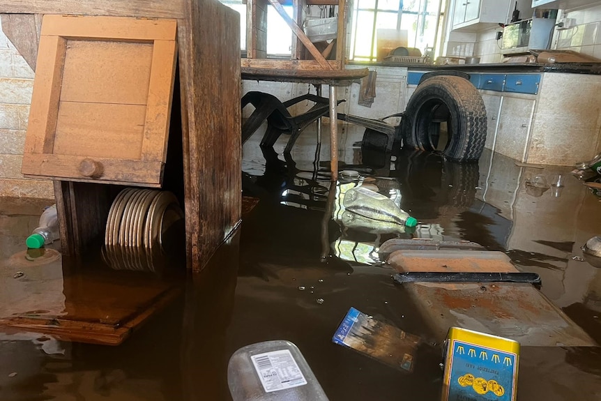 Damage inside a flooded building at outback sheep station.  