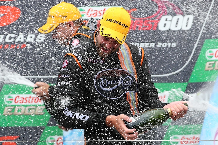Shane Van Gisbergen celebrates winning the Gold Coast 600