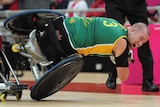 Steelers' wheelchair rugby star Ryley Batt takes a tumble against Canada.