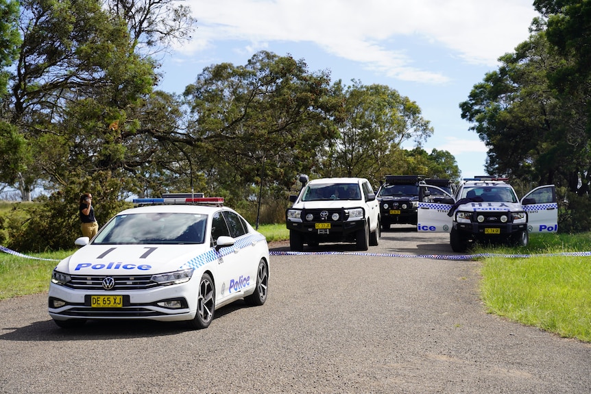 NSW Police officers and cars at a private property on Hazelton Road at Bungonia on Monday, February 26, 2024