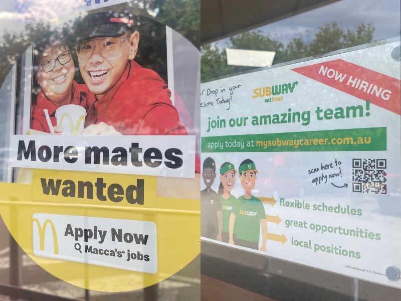 McDonald's and Subway signs inw indows looking to hire staff.