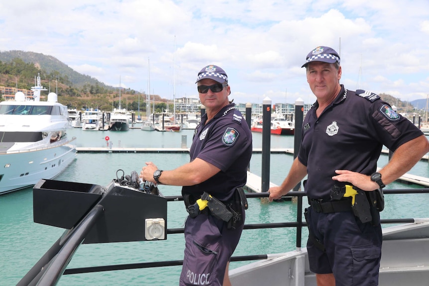 Two police officers on a boat