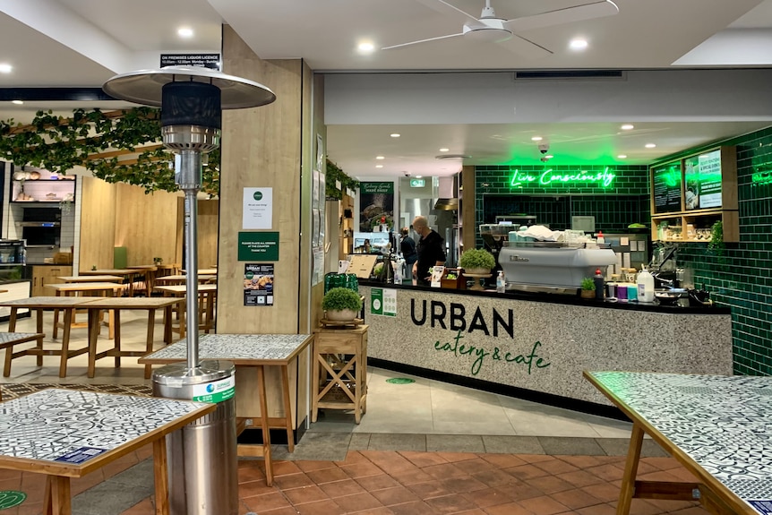 Empty tables at the Urban Eatery and Café  