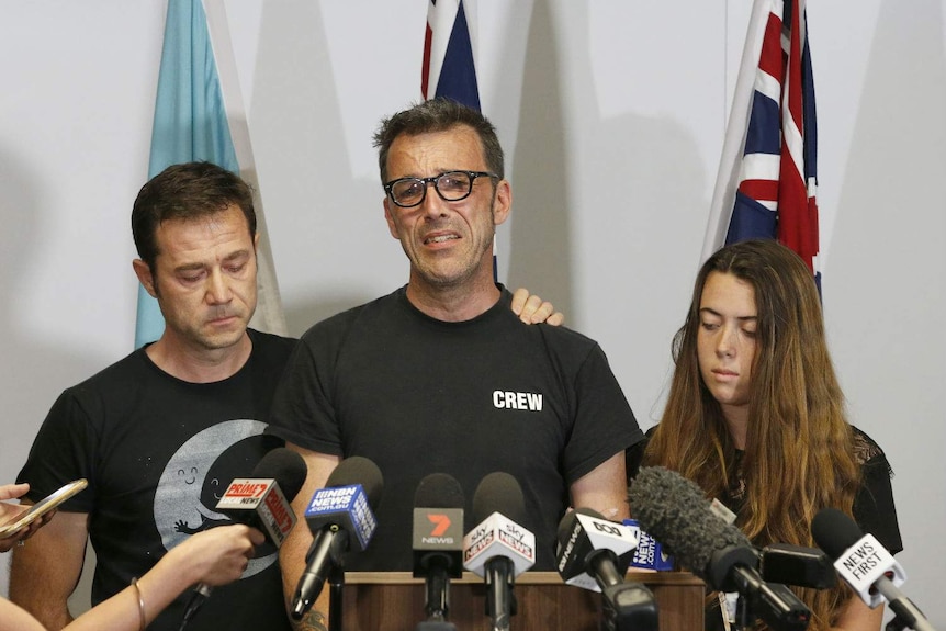 Laurent Hayez, father of missing Belgian backpacker Theo Hayez, supported by his son’s Godfather JP Hayez and cousin Lisa Hayez.