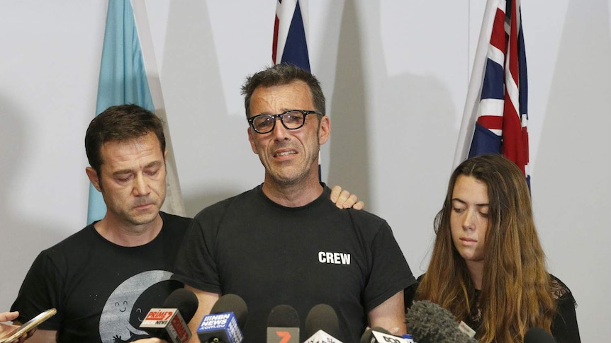 Laurent Hayez, father of missing Belgian backpacker Theo Hayez, supported by his son’s Godfather JP Hayez and cousin Lisa Hayez.