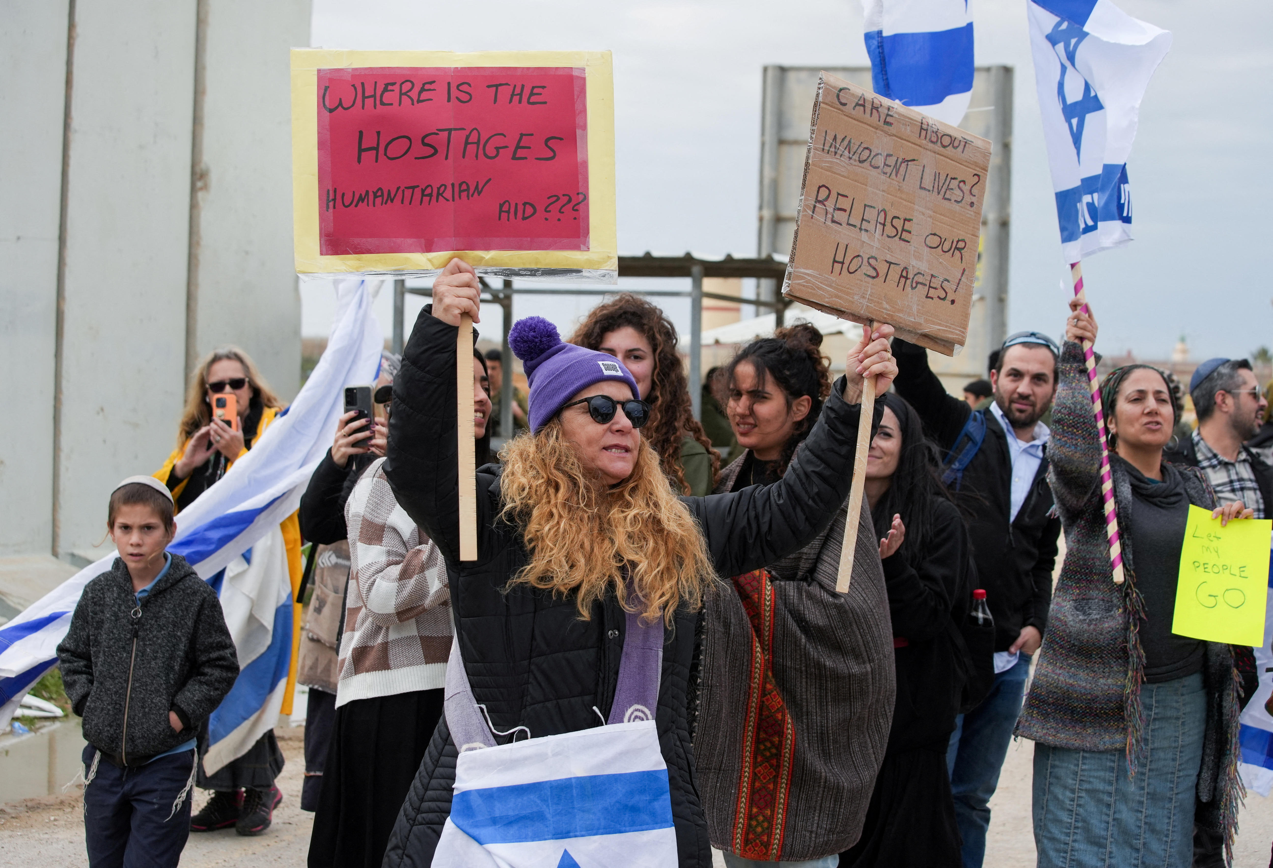 Protesters hold up sign calling for the release of hostages in Gaza. 