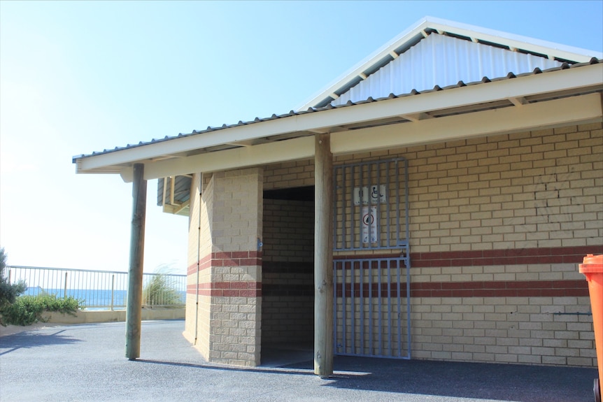 A photo of a brick block of public toilets.