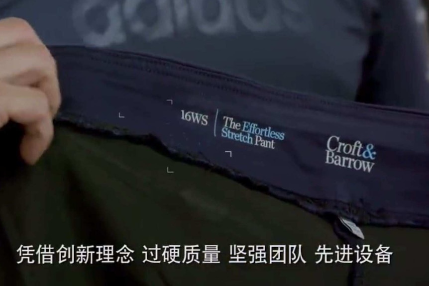 Croft & Barrow's logo on a pair of pants, from a promotional video for the Xinjiang-based company Golden Futur