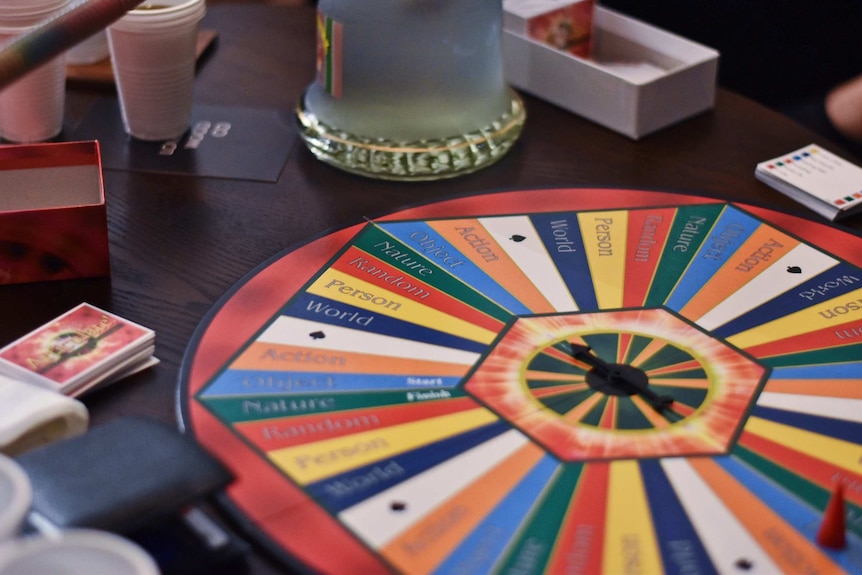 A generic image of an Articular board and cards laid out on a table.