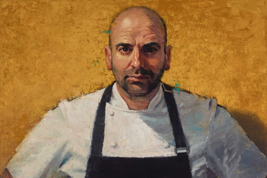 An oil on linen portrait of George Calombaris in a chef jacket and apron.