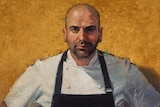 An oil on linen portrait of George Calombaris in a chef jacket and apron.