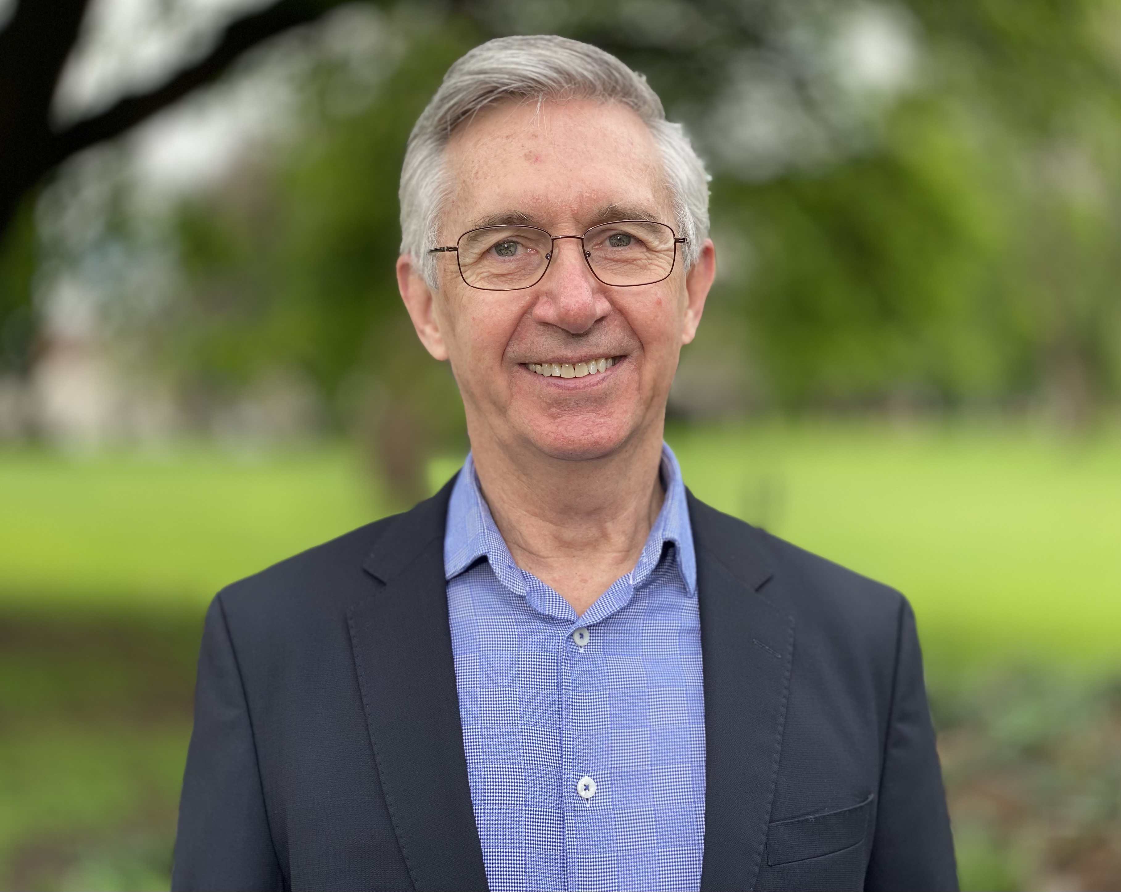 Ken Phillips smiling at the camera at a park in Flagstaff, Melbourne during lockdown. 