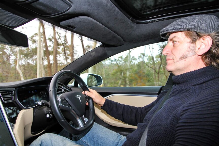 Davide Michielin at the wheel of his Tesla.