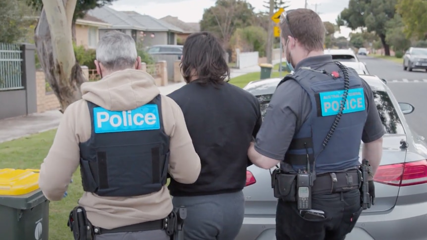 A man being arrested.