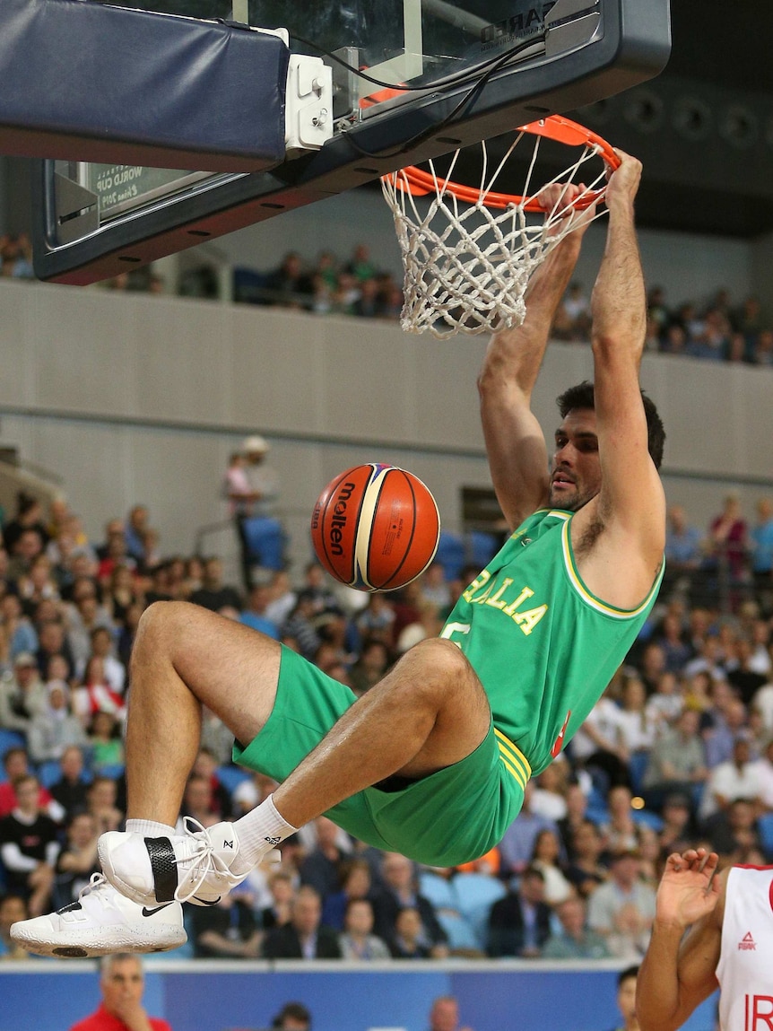 Todd Blanchfield dunks against Iran for the Boomers