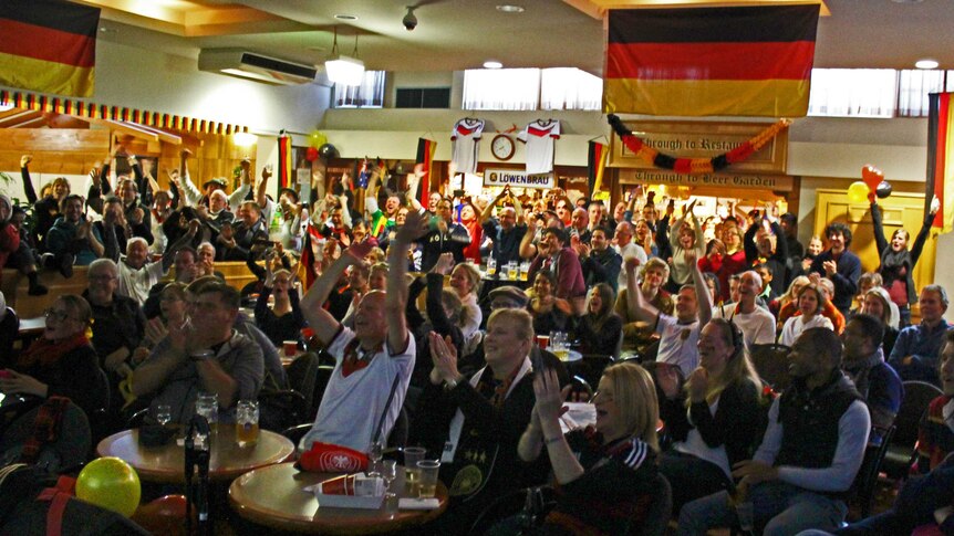 Fans at the German Club in Canberra celebrate winning the World Cup.