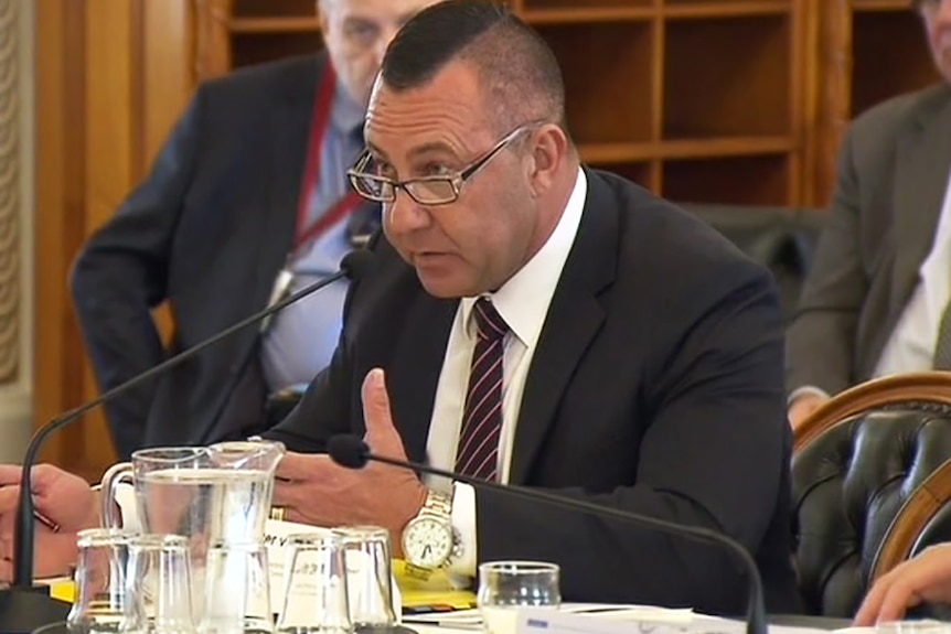Queensland electoral commissioner Walter van der Merwe speaks during a meeting in Brisbane.