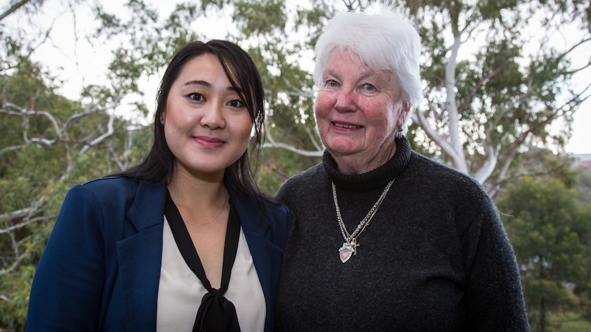 Roma Xiong (left) and Margaret Eldridge (right) are celebrating 40 years of Hmong living in Tasmania.