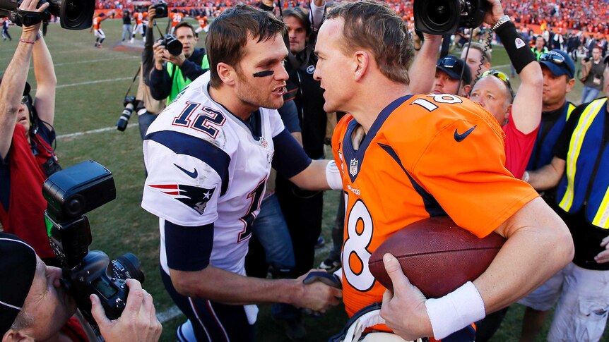 Tom Brady congratulates Peyton Manning after the Broncos win.
