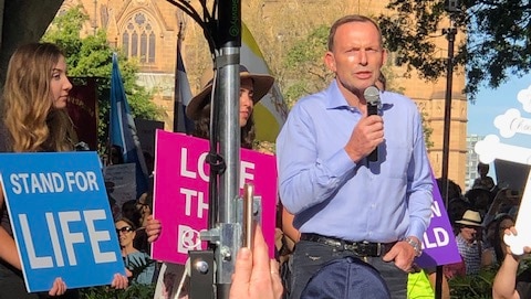 Tony Abbott speaking on stage