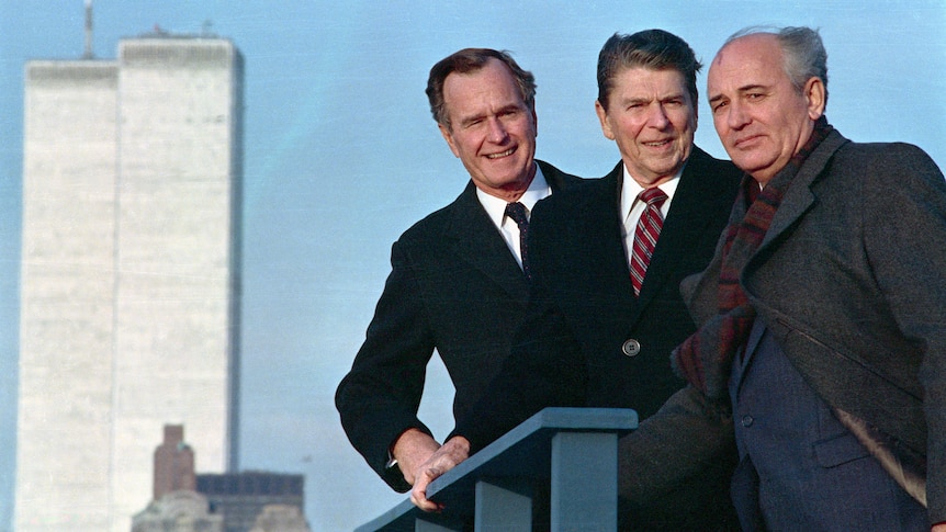 President Ronald Reagan, Vice President George Bush and Soviet General Secretary Mikhail Gorbachev on a rooftop in 1988.