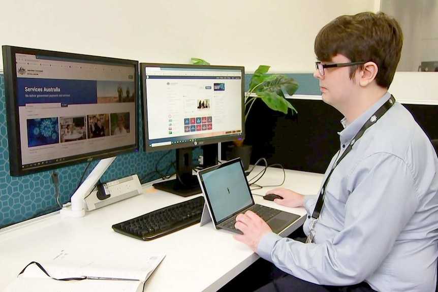 Man working on computer at his desk