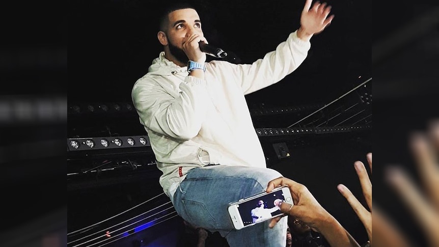 An Instagram shot by @jenniferveliz_ of Drake performing at the Marquee in Sydney