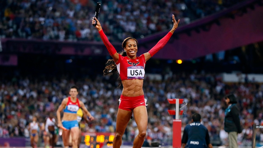 Sanya Richards-Ross celebrates anchoring the US to the women's 4x400m relay gold medal.