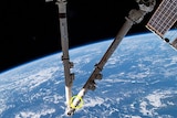 The impact of a piece of space junk hitting the International Space Station's robotic arm.