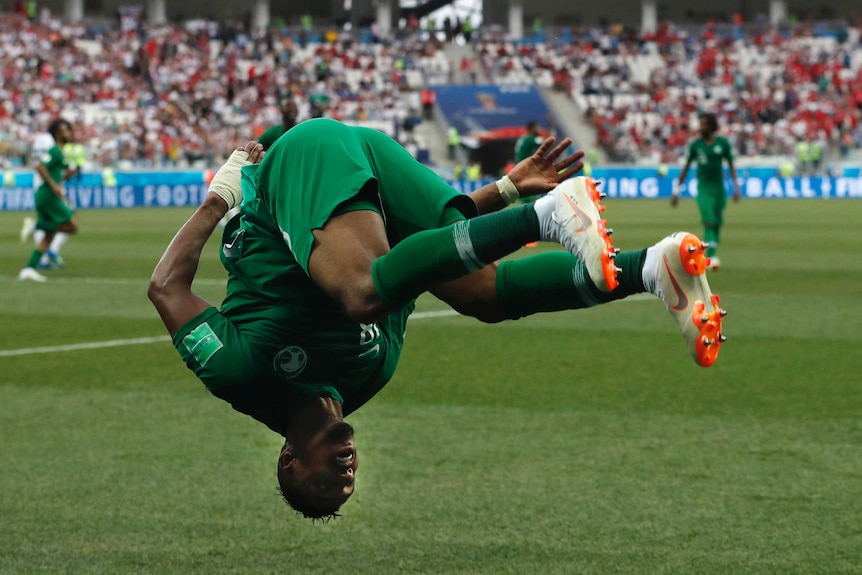 Salem Aldawsari celebrates a goal with a front flip