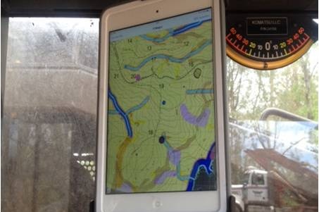 An iPad mounted in the cab of a harvester on the NSW north coast.