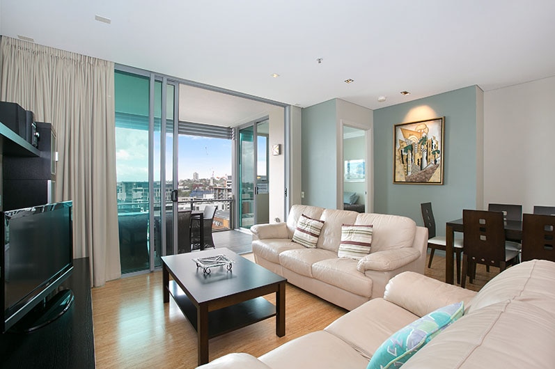 Lounge room and view of three-bedroom apartment at South Brisbane.