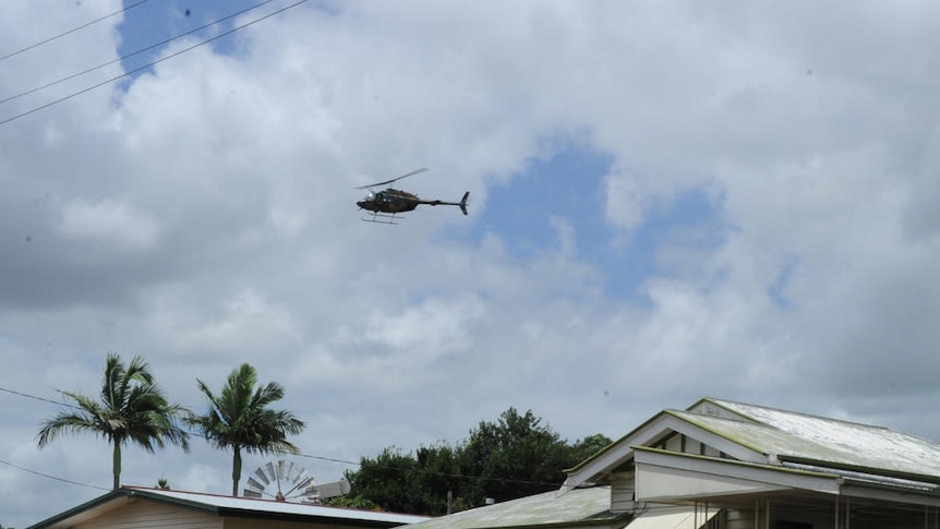 Wreckage: two Australian Defence Force helicopters fly over the devastated township of Grantham