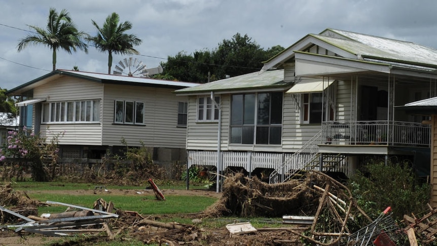 Defence Force helicopters fly over the devastated township of Grantham on January 15, 2011.